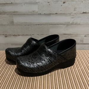 Dansko Women’s Black Patterned Clogs